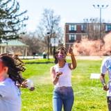 Students throwing color at each other for the HOLI Festival. 